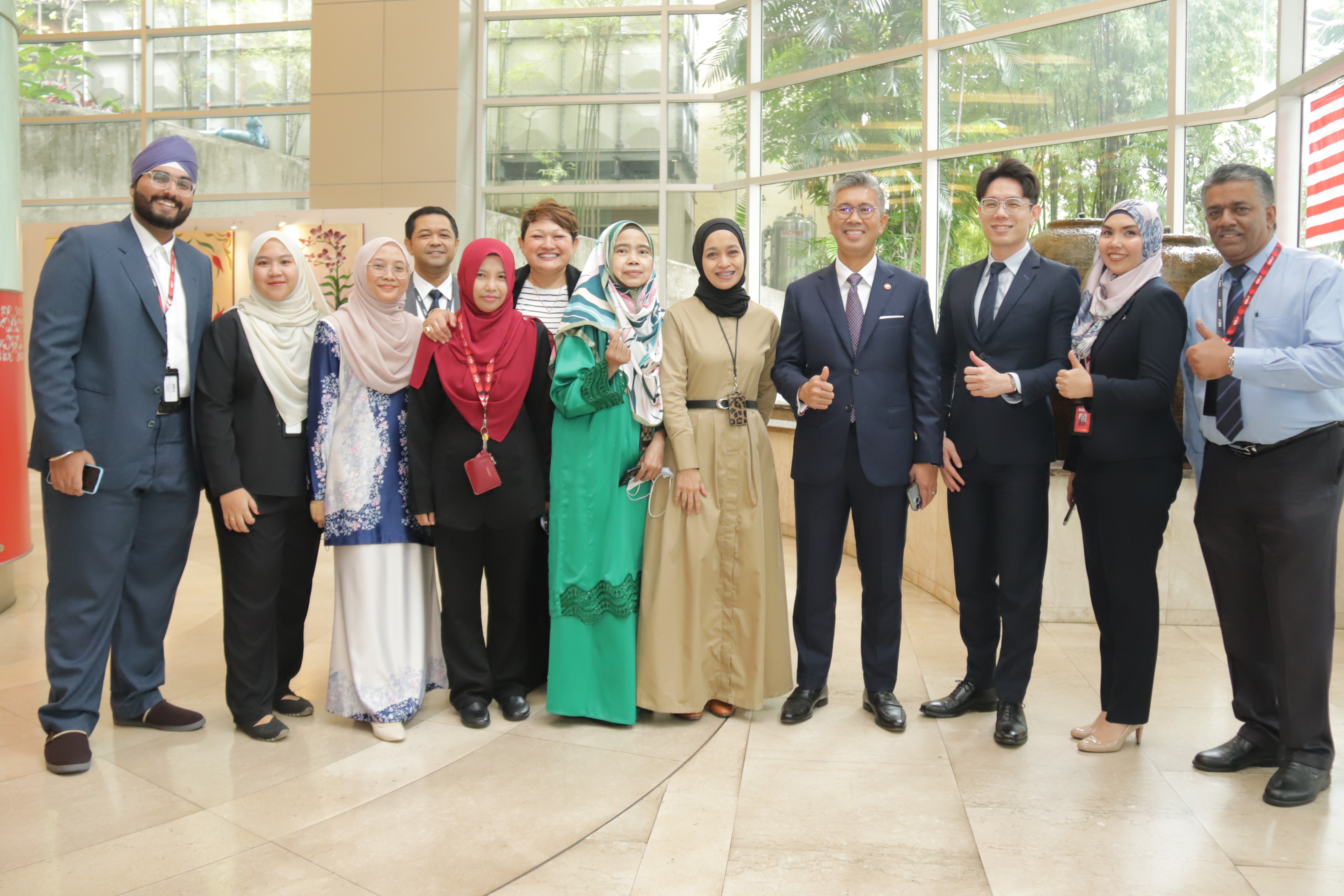 MITI Minister YB Tengku Zafrul with MIDF employees
