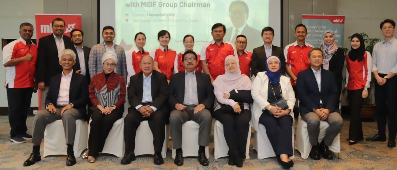 Board members and Development Finance Division representatives at the hi-tea in Sabah