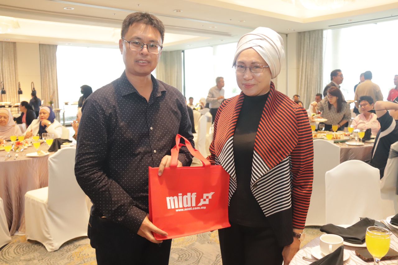 Dato' Yasmin and a Development Finance Division client